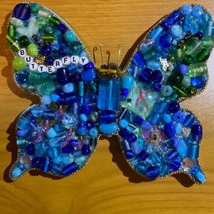 Beaded butterfly wall plaque